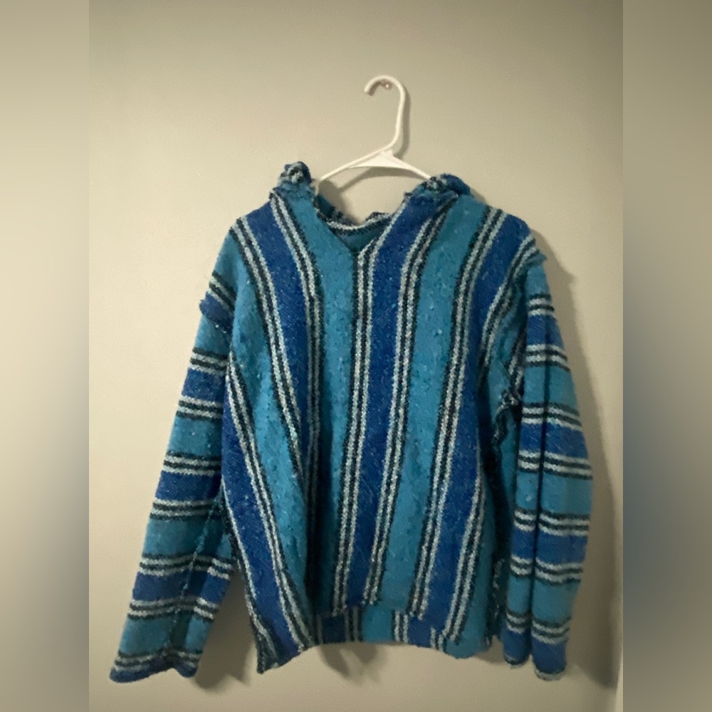 Blue poncho type sweater